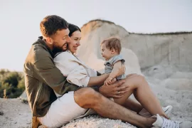 Young family with little son on the sunset Young family with little son on the sunset
